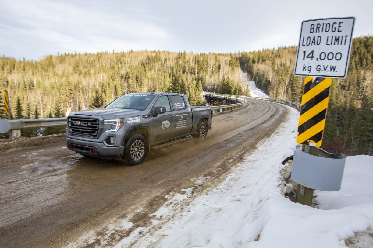 gmc pickup front three-quarter action at alcan 5000 winter rally