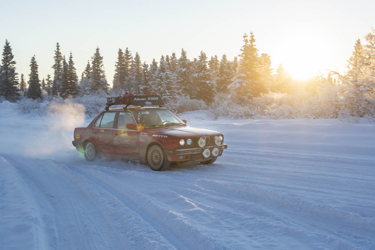 bmw front three-quarter action at alcan 5000 winter rally