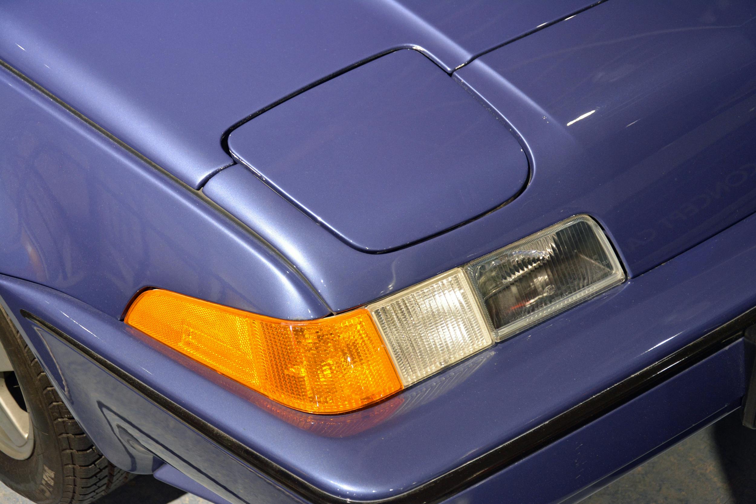 saab museum volvo 480 convertible turbo headlight detail