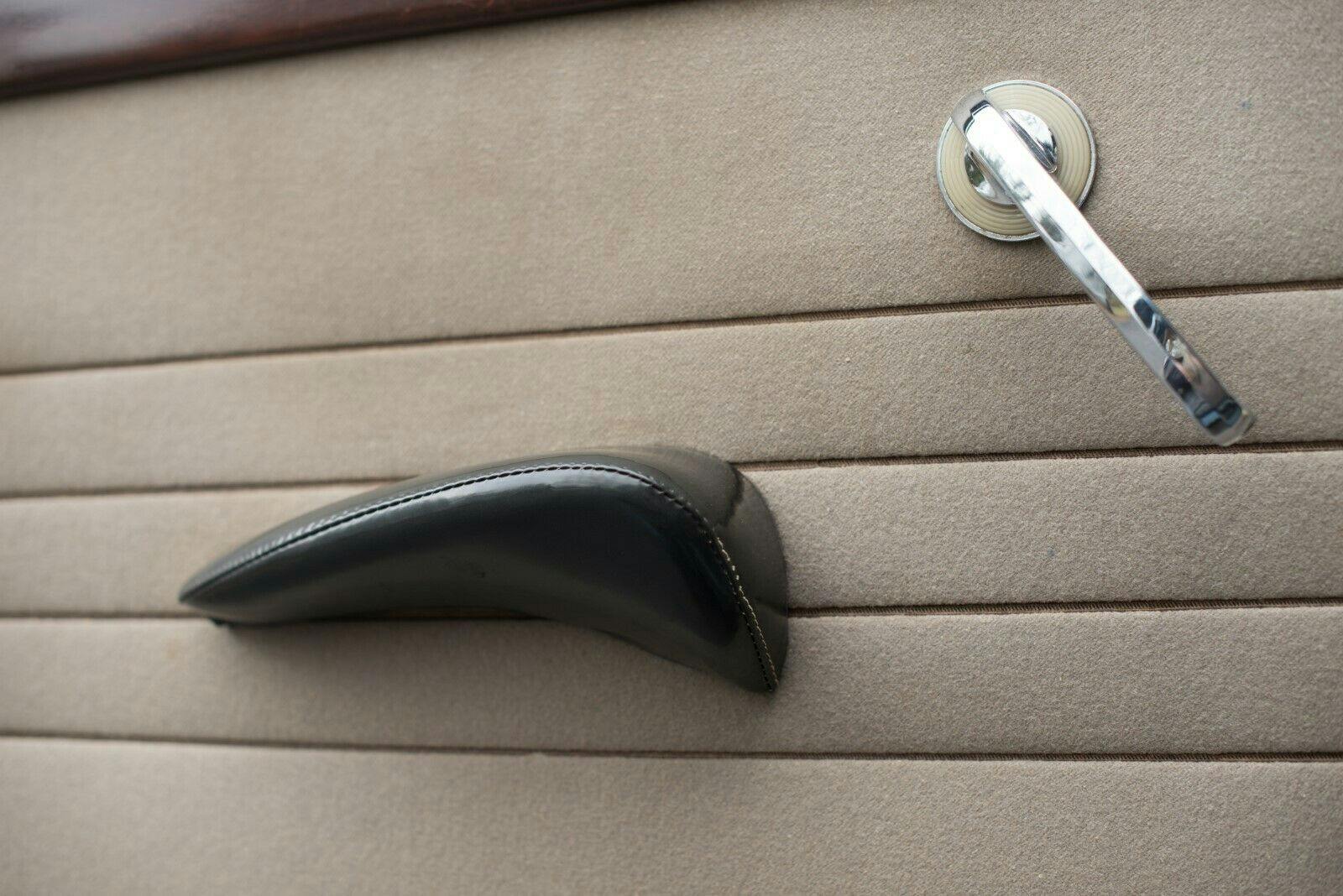 1949 Packard Deluxe Club Sedan - Close-up interior door handle