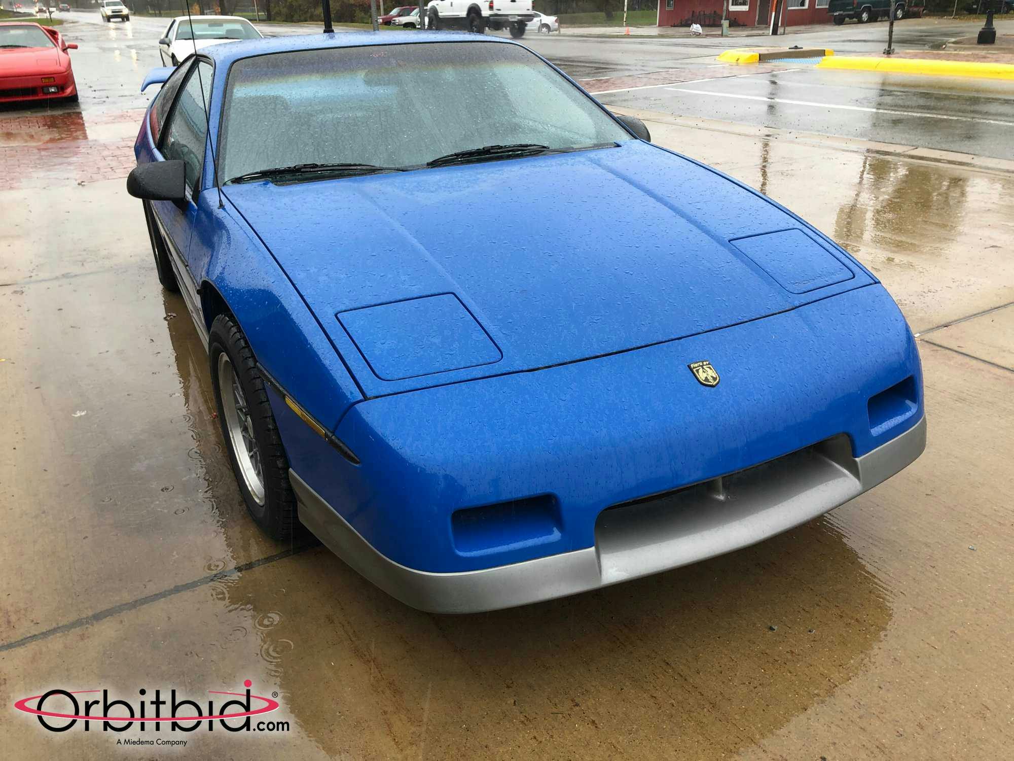 1987 Blue Fiero GT Front Three-Quarter