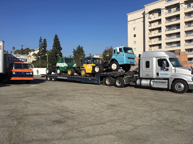 Movie Prop Trucks Loaded on Semi Flatbed