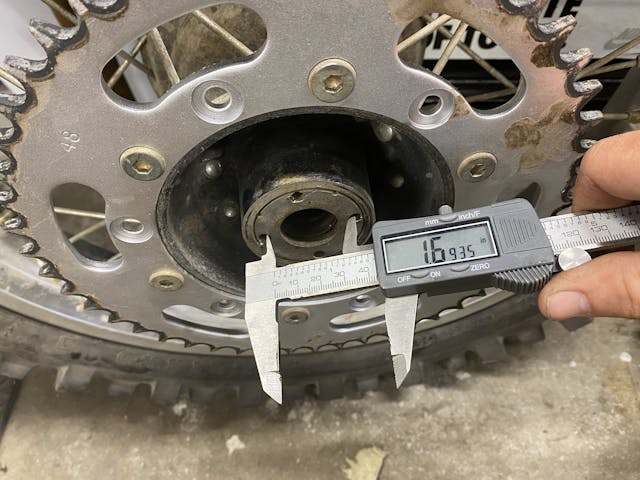calipers measuring XR250R rear hub