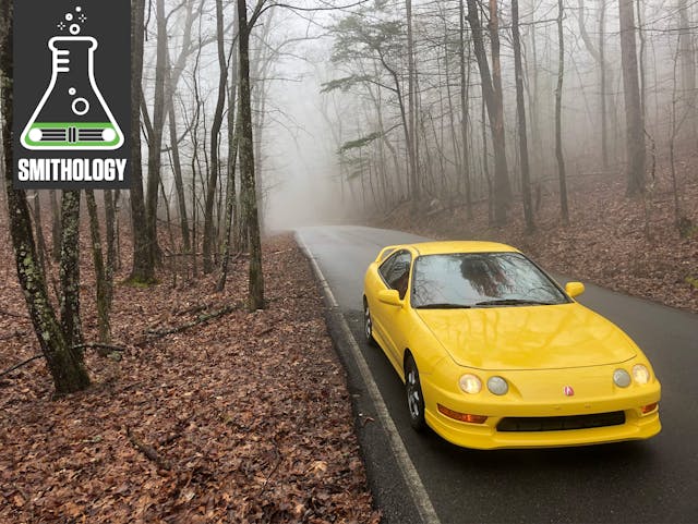 Yellow Acura Front Three-Quarter On Road In Foggy Hills