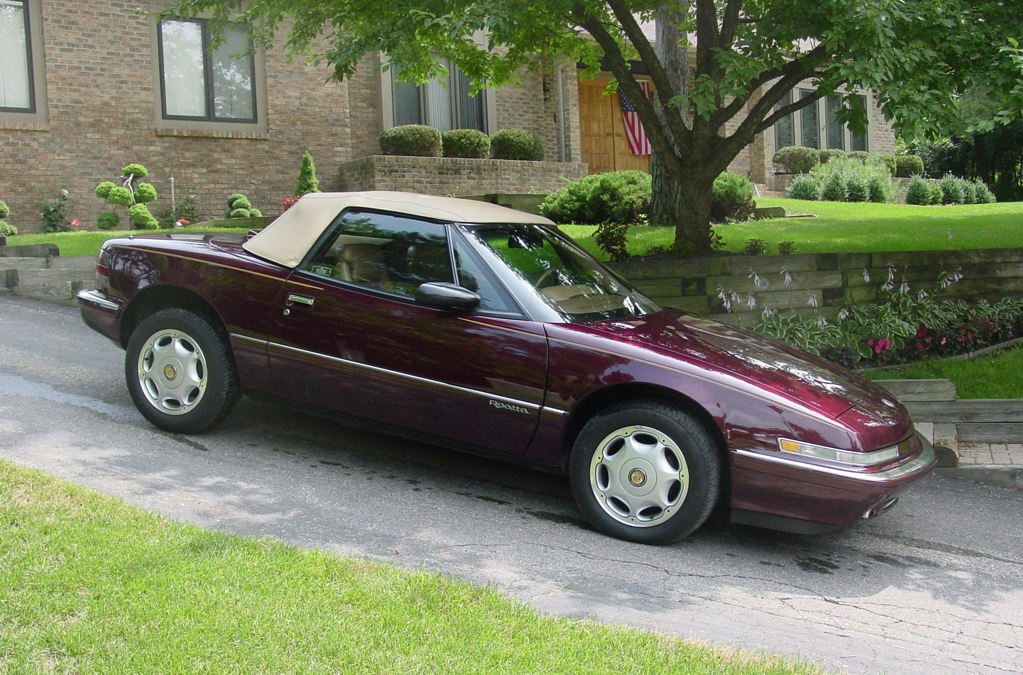 Reatta Convertible Coupe Side Profile In Driveway