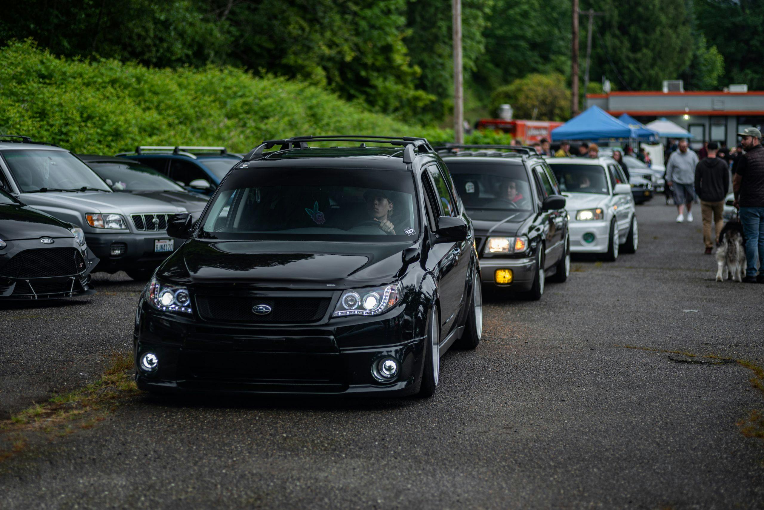 Subaru Wagons Rolling Through Festival