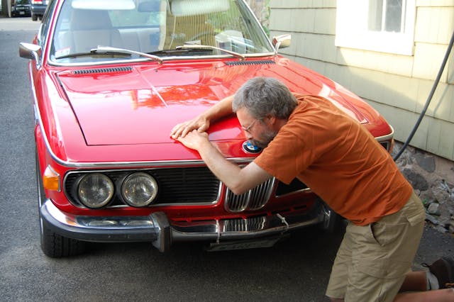 Rob Siegel - Sorting out a car - Rob kissing a BMW