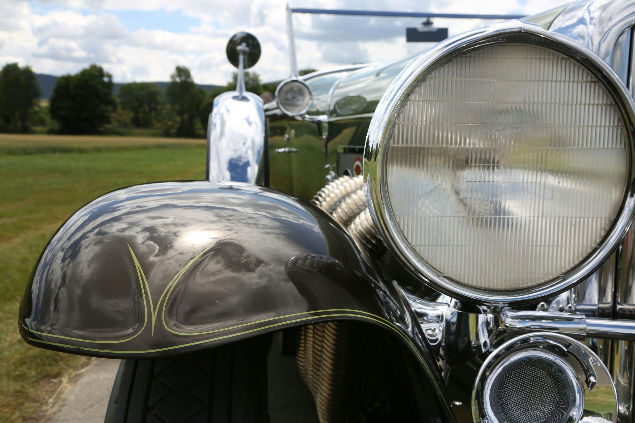 1929 Duesenberg Model SJ Convertible Sedan by Murphy pinstripe headlight