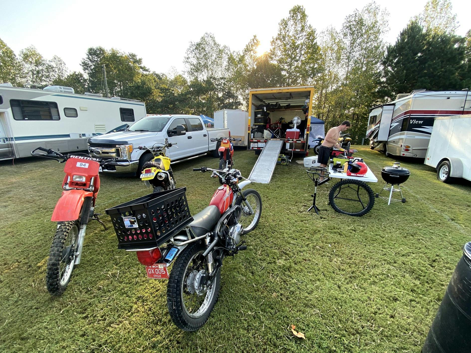 Barber bikes campers and moving truck camp