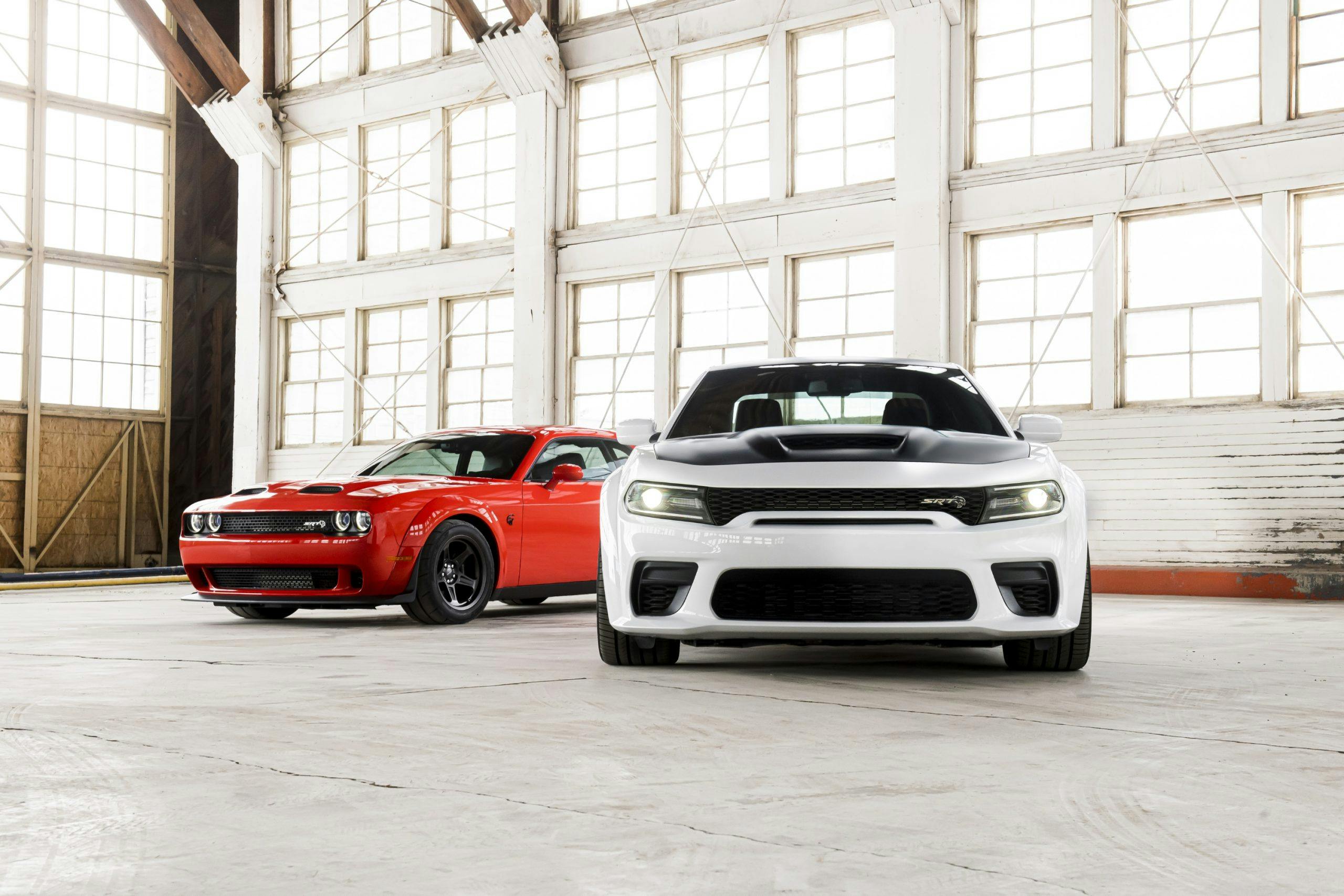 2020 Dodge Challenger SRT Super Stock (left) and 2021 Dodge Char