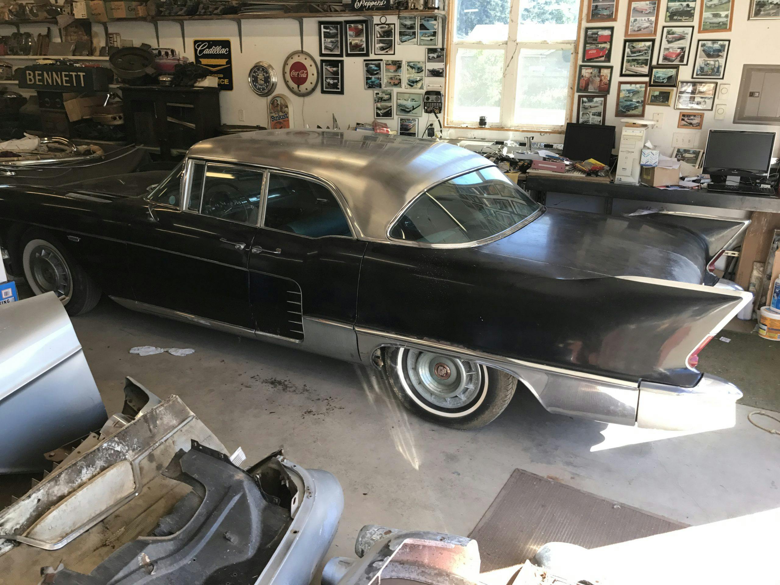 old vintage cadillac black in garage