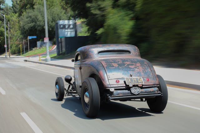 1934 Ford coupe driving rear