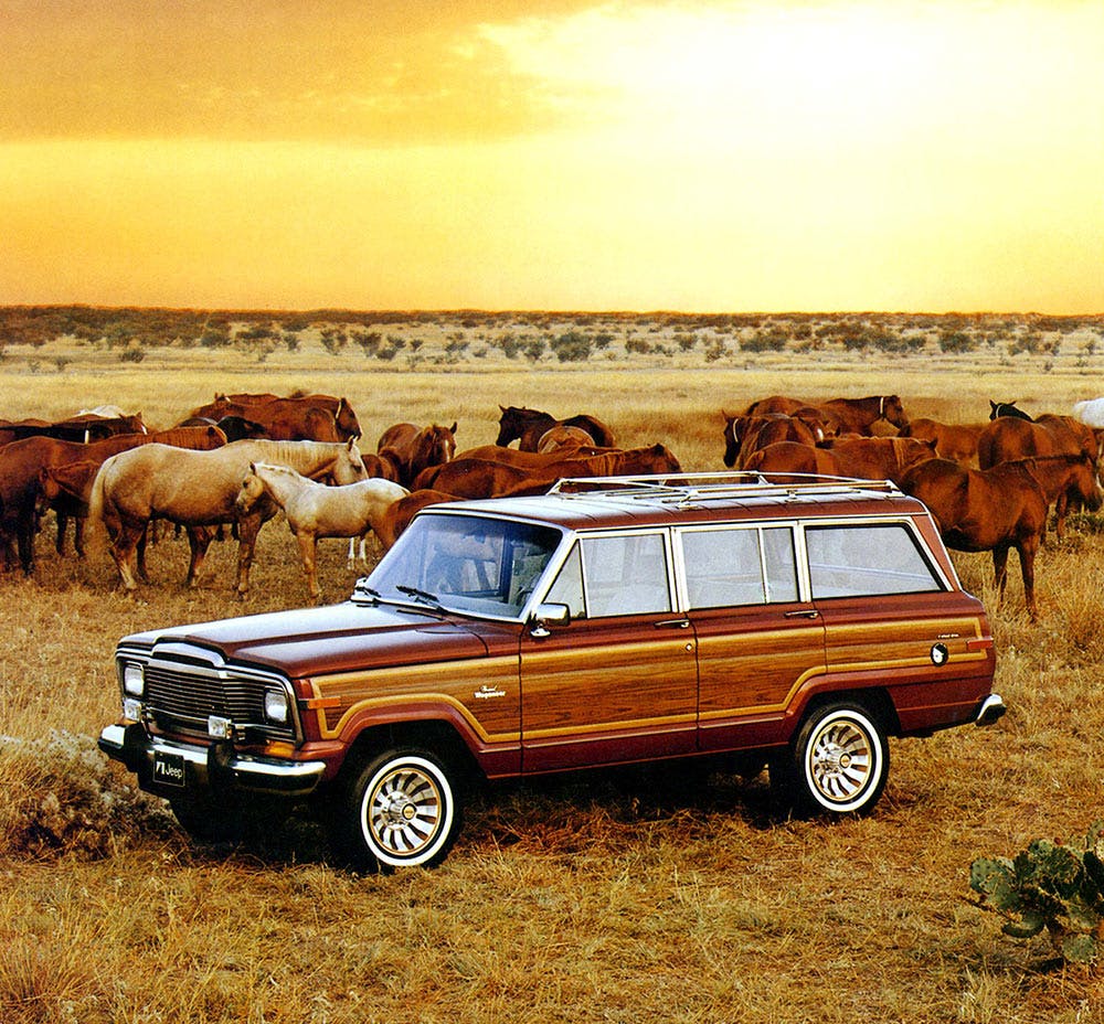 1984 Jeep Grand Wagoneer among broncos front three-quarter art ad