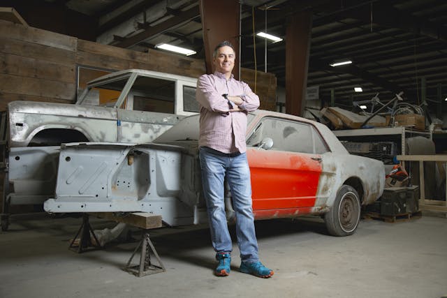 seth burgett beside ford bronco mustang restoration projects