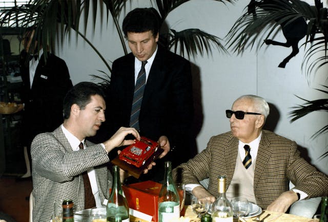 enzo and piero ferrari at dinner talking f40