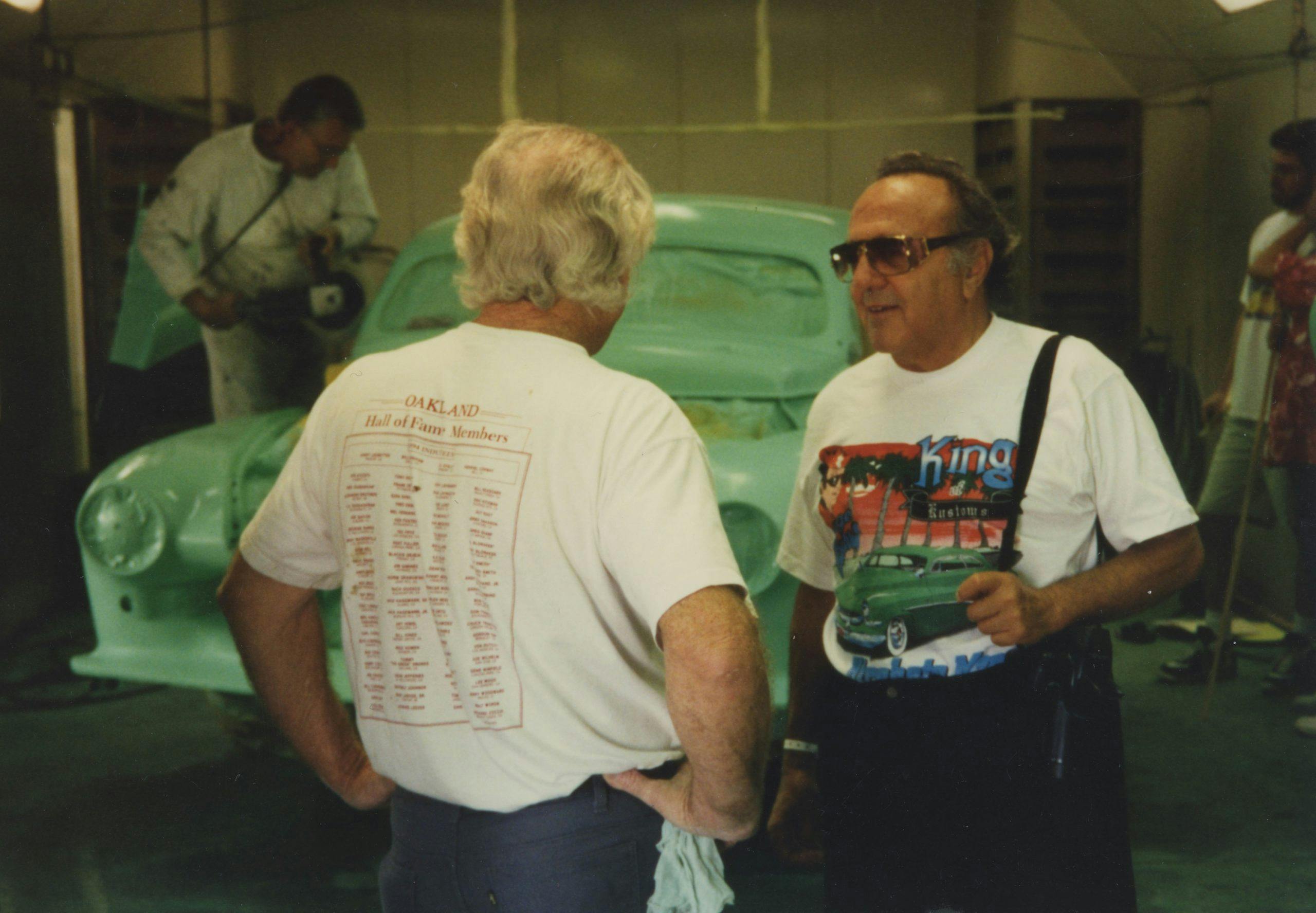 McNeil Family chatting during car restoration
