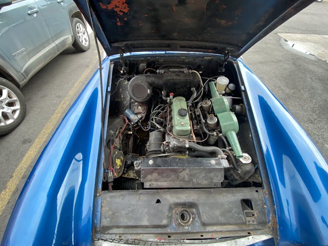 Under hood of Austin Healey Sprite