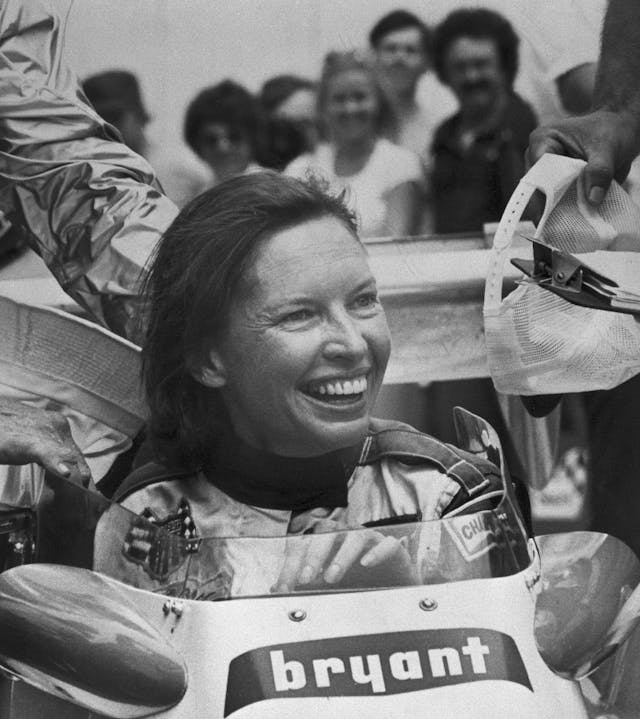 Janet Guthrie Grinning in Racecar