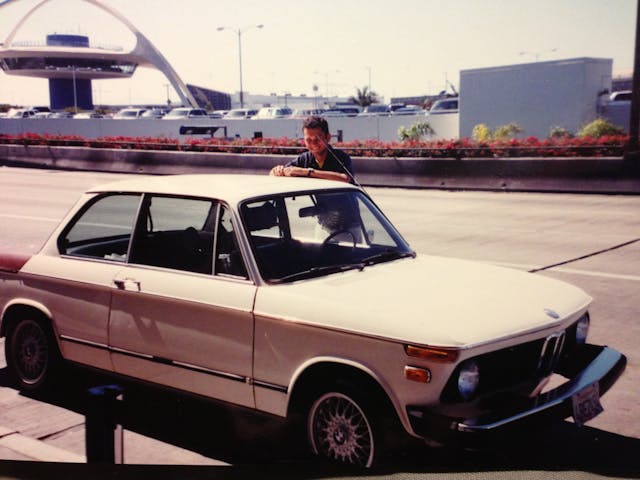 author sam smith with retro bmw 2002