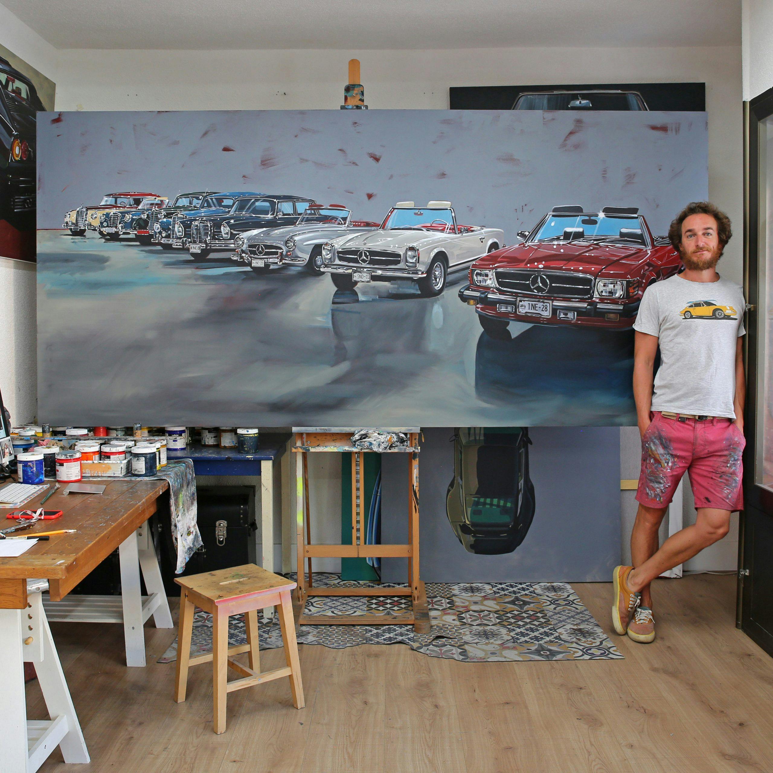 artist manu campa with classic mercedes-benz painting in studio