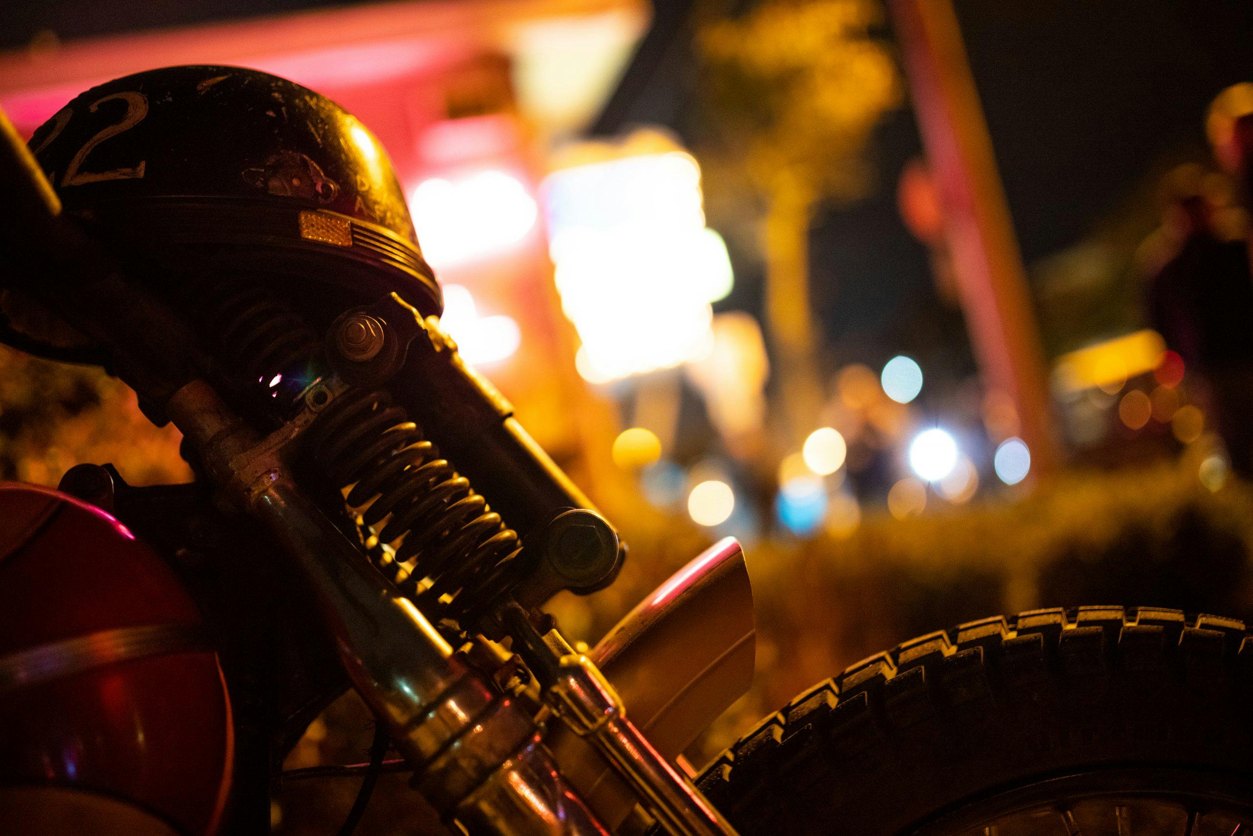 motorbike at night front fork