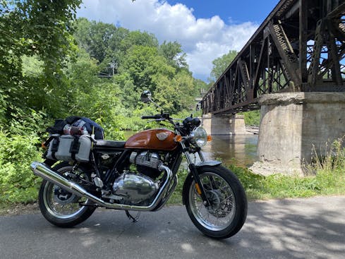 Royal Enfield INT650 with gear by bridge