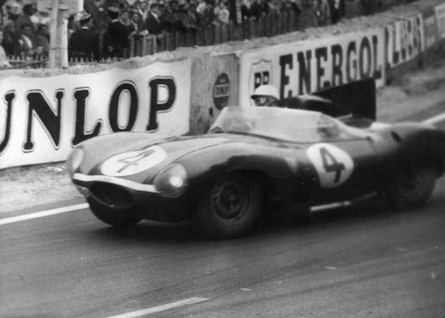 Ninian Sanderson and Ron Flockhart drive Jaguar D-type to victory