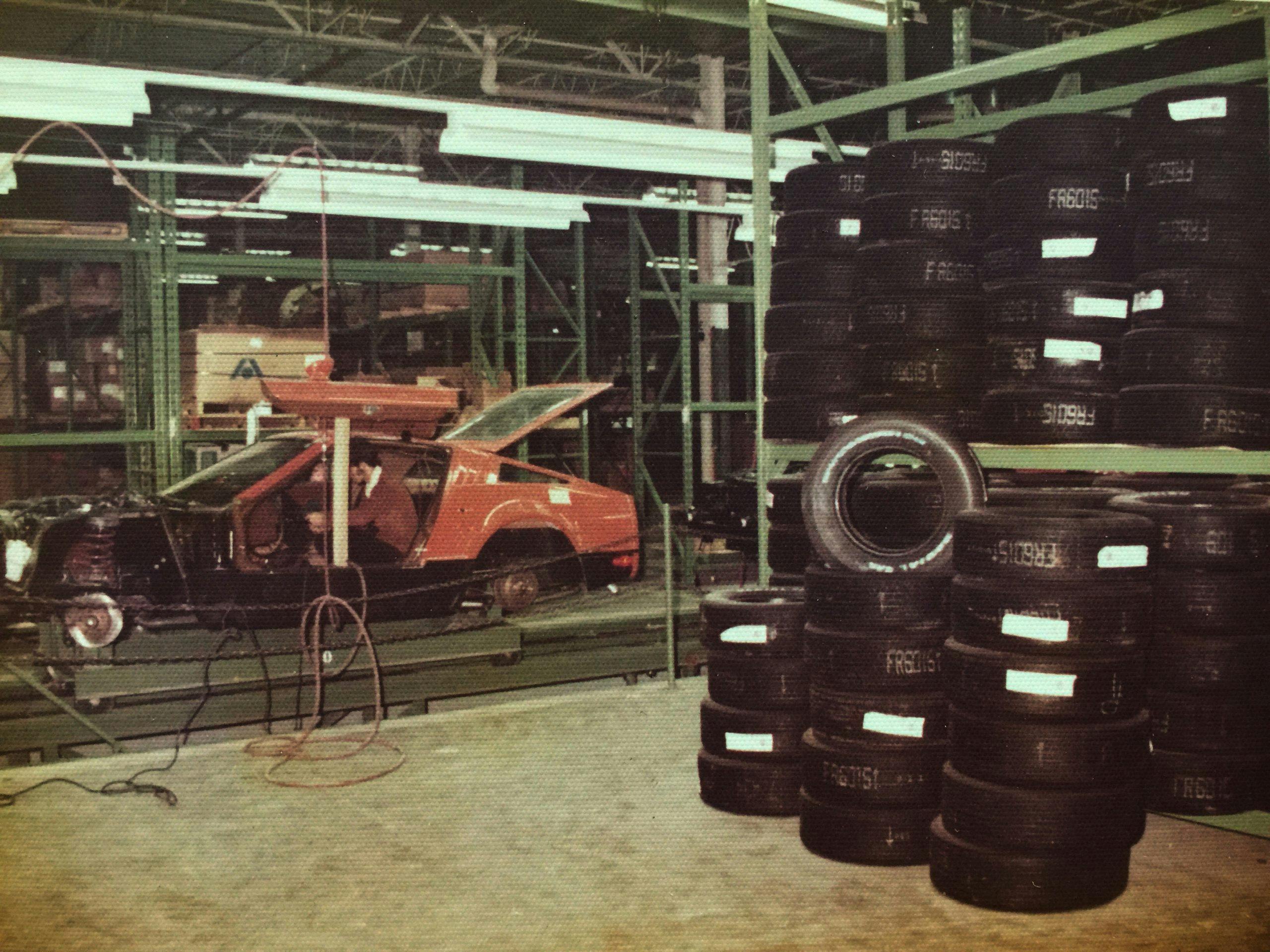 bricklin sv-1 assembly line beside tires
