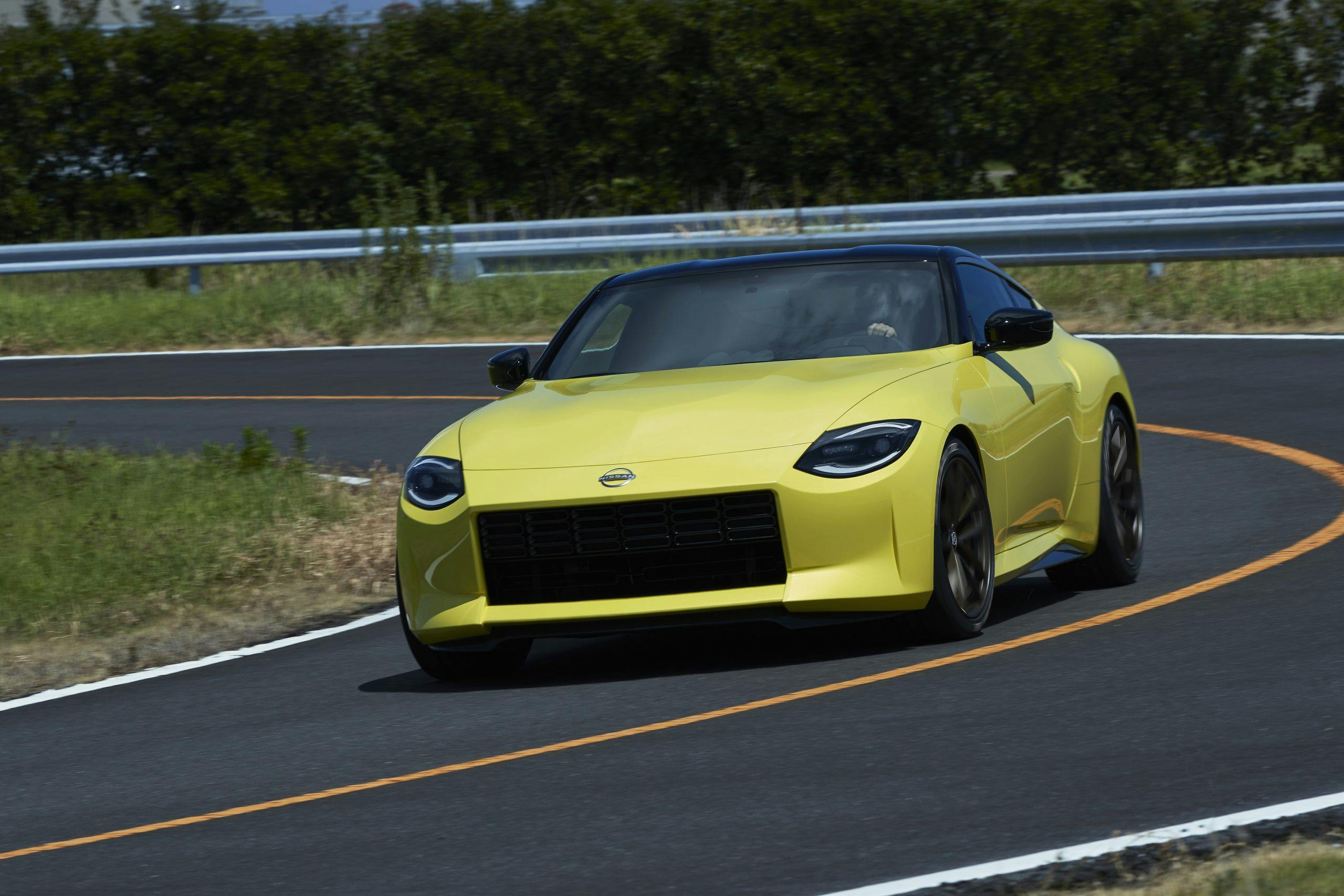nissan new z car prototype front three-quarter cornering dynamic action