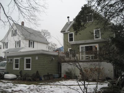 shoebox garage exterior during new england winter