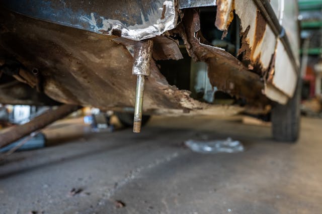 pin on rotted corner of bmw 2002