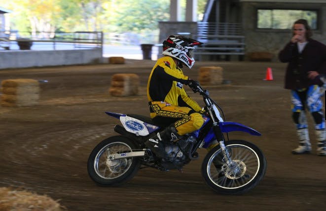 American Supercamp Riding School moto rider on dirt action