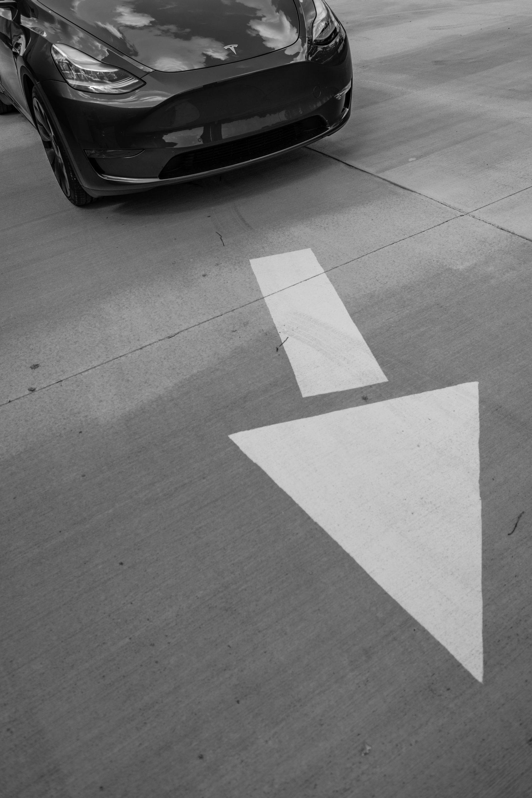 Tesla Model Y pavement arrow front action