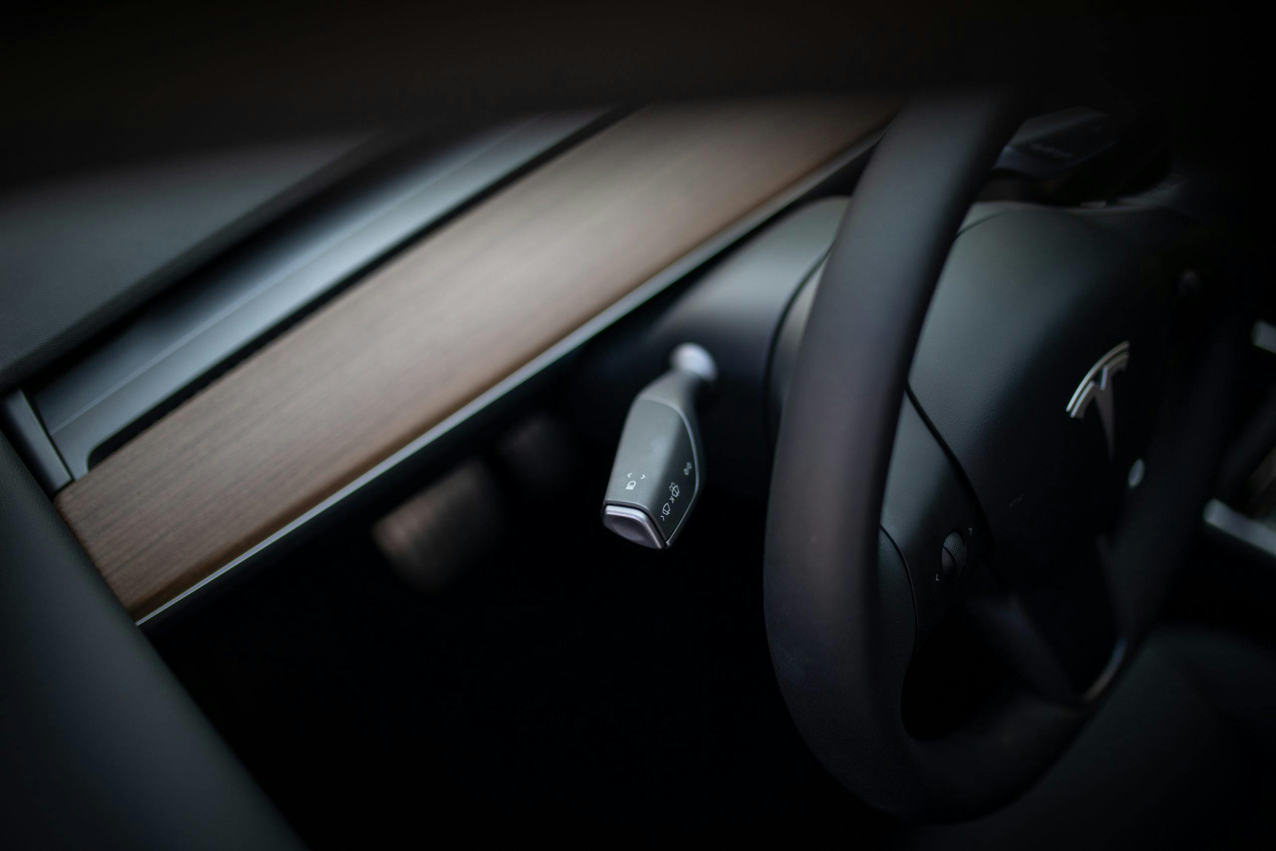 Tesla Model Y steering wheel light selector detail