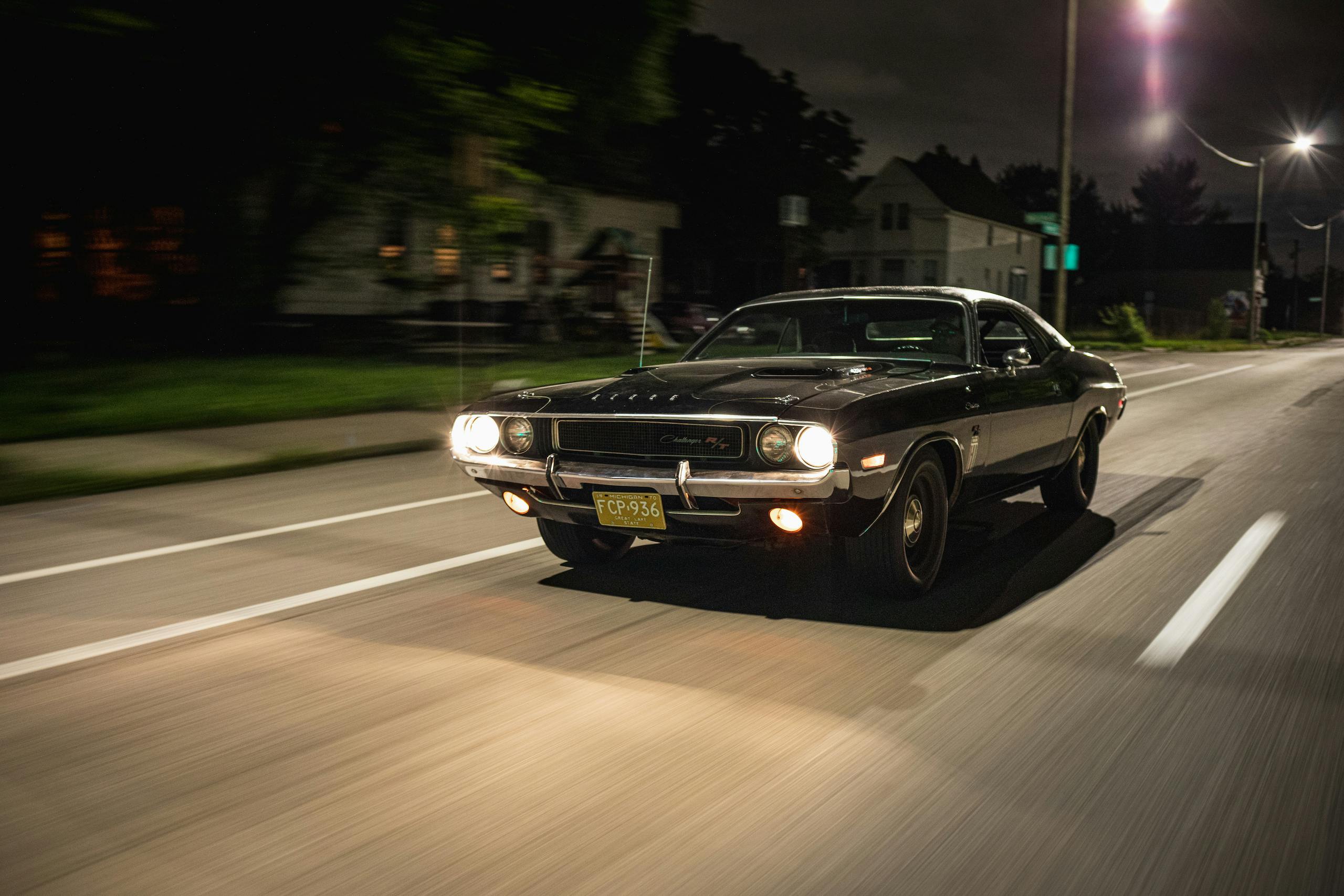 1970 Challenger front three-quarter dynamic action after dusk