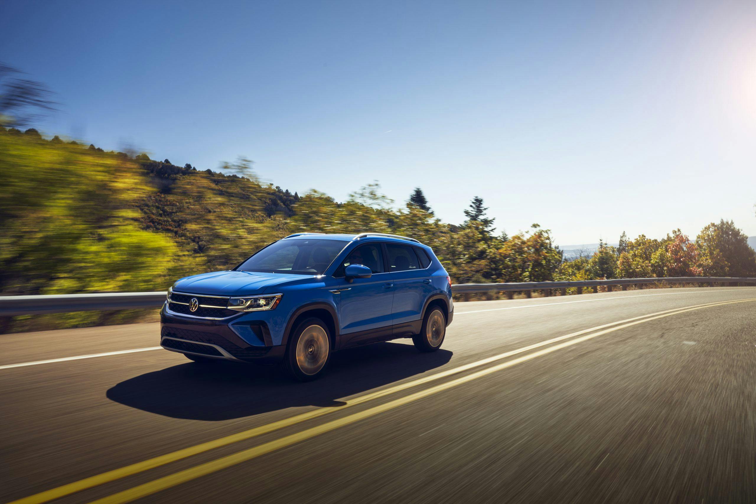 2022 Volkswagen Taos driving drives front three quarter