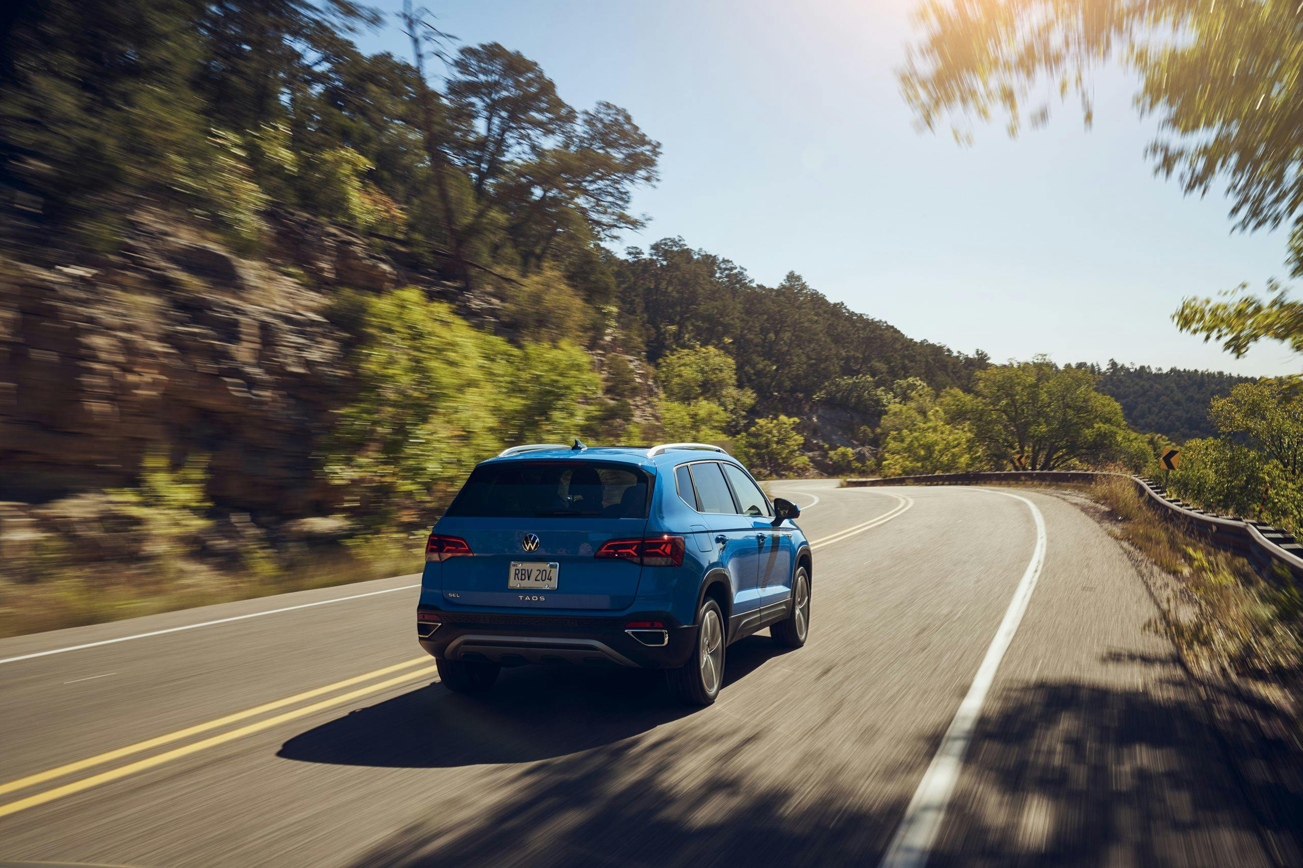 2022 Volkswagen Taos driving rear three quarter