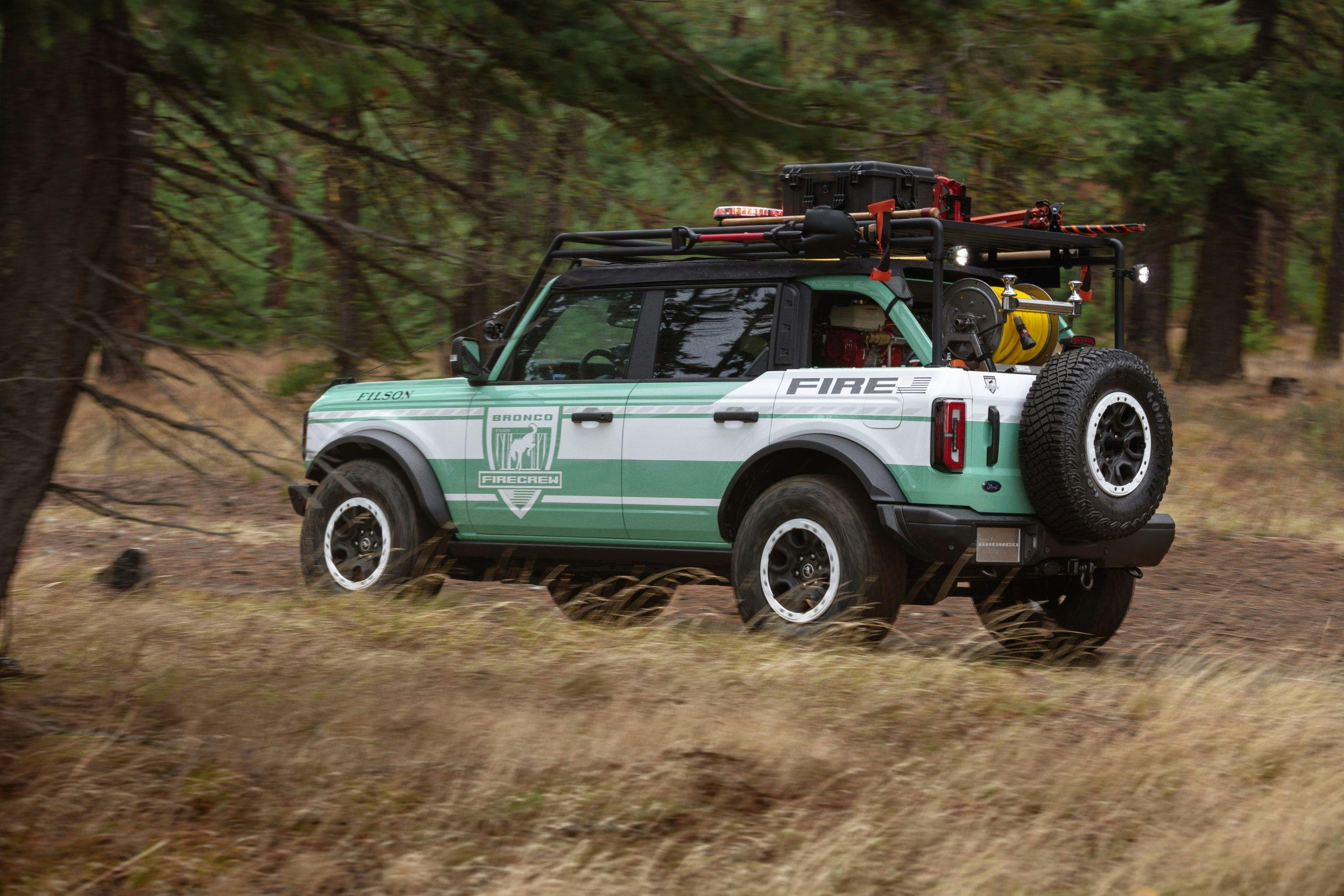 Bronco + Filson Wildland Fire Rig Concept driving in woods