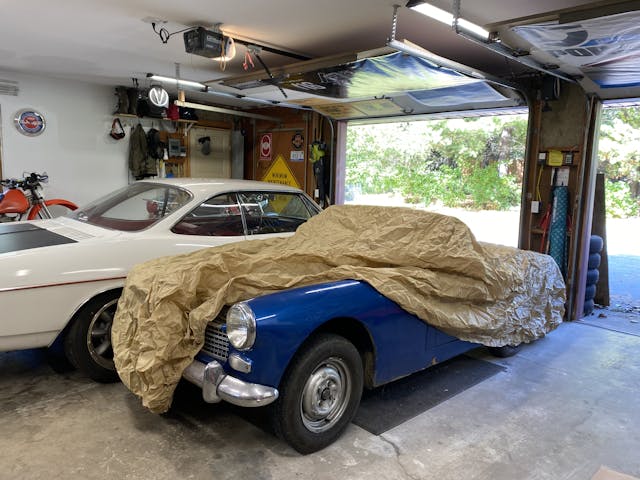 Austin Healey Sprite under basic cover