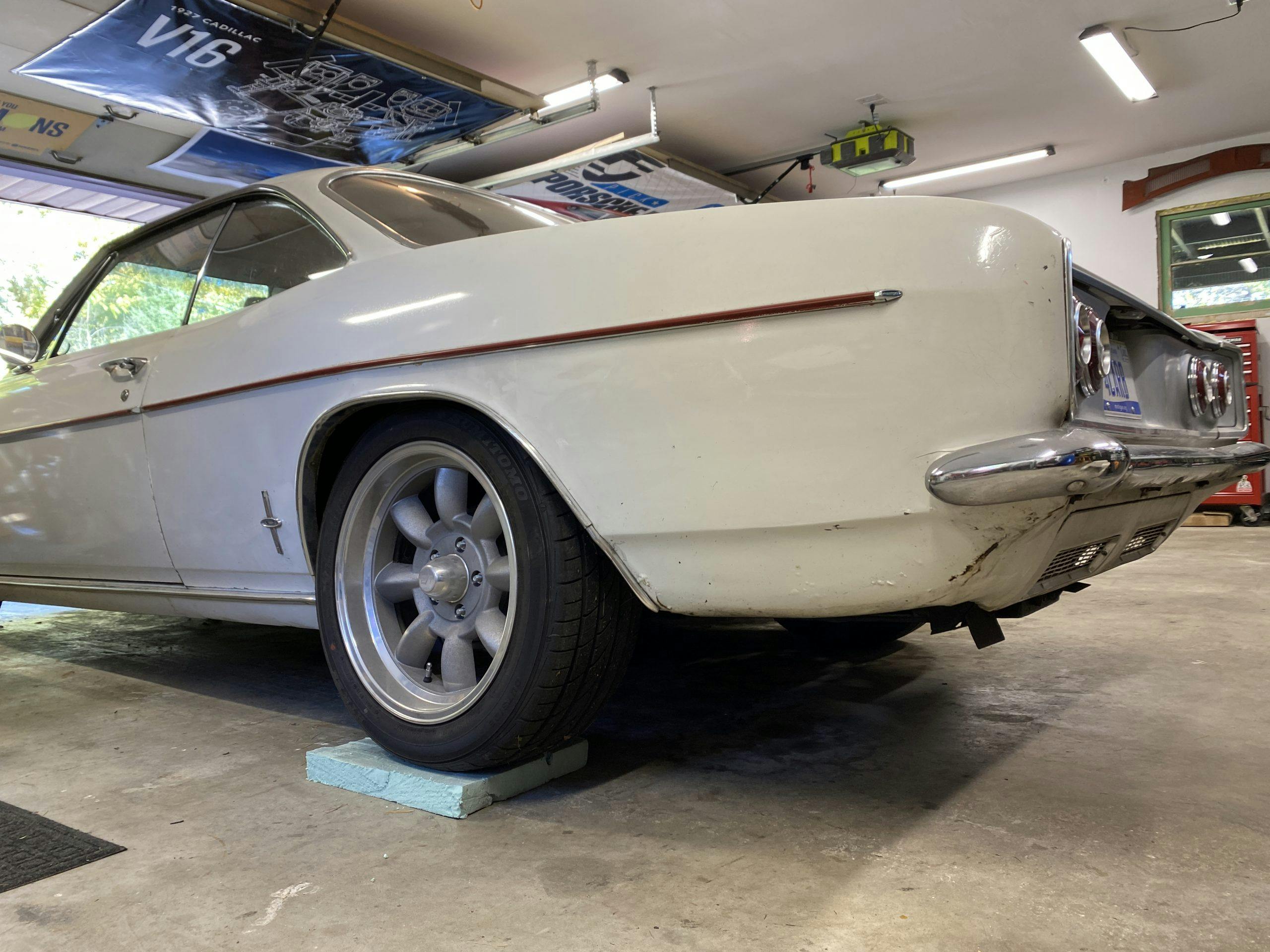 Chevrolet Corvair sitting on rigid foam to protect tires