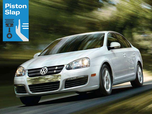 white VW Jetta dynamic action front three-quarter