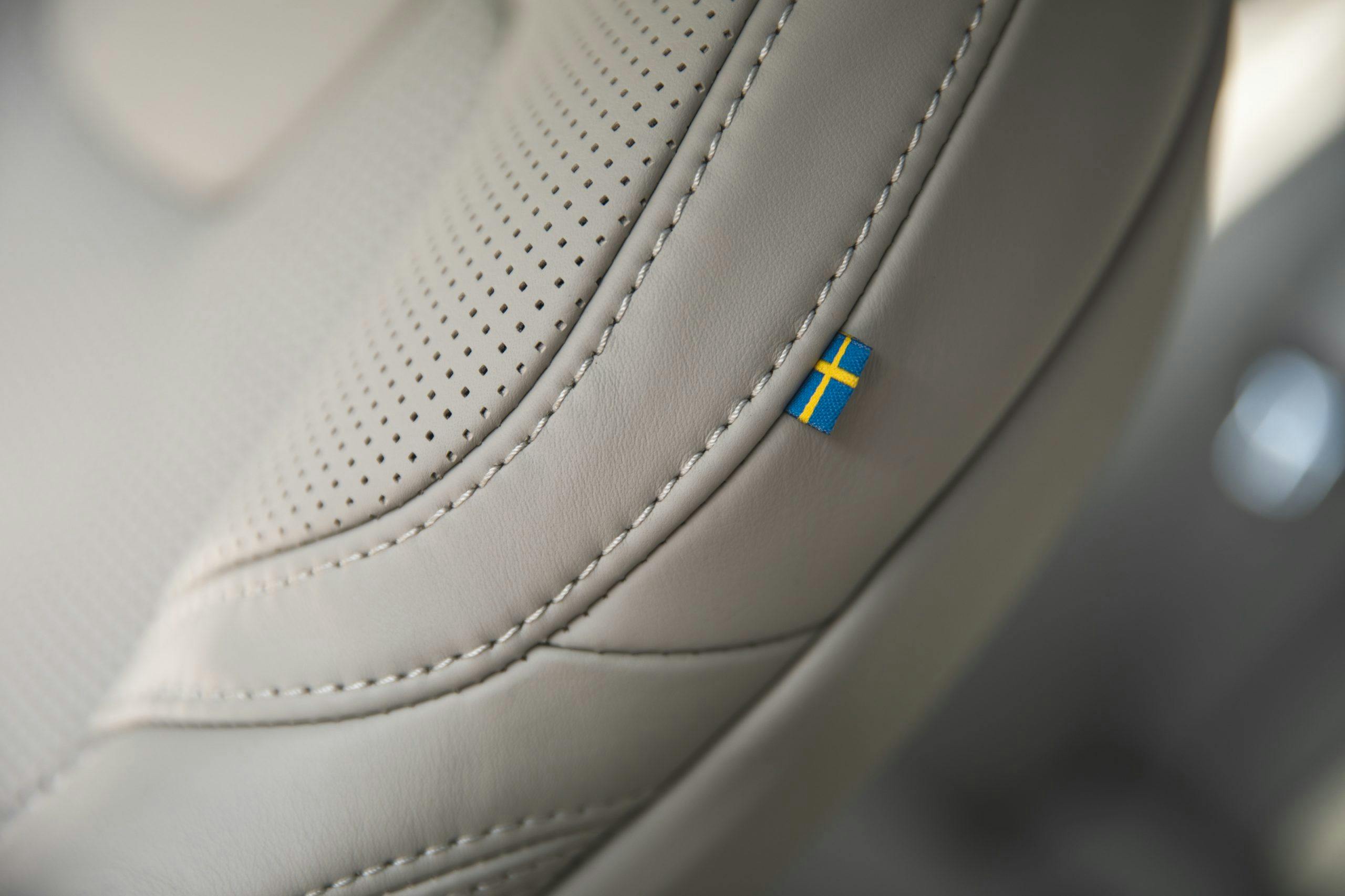 Volvo V90 leather seat detail stitching swedish flag