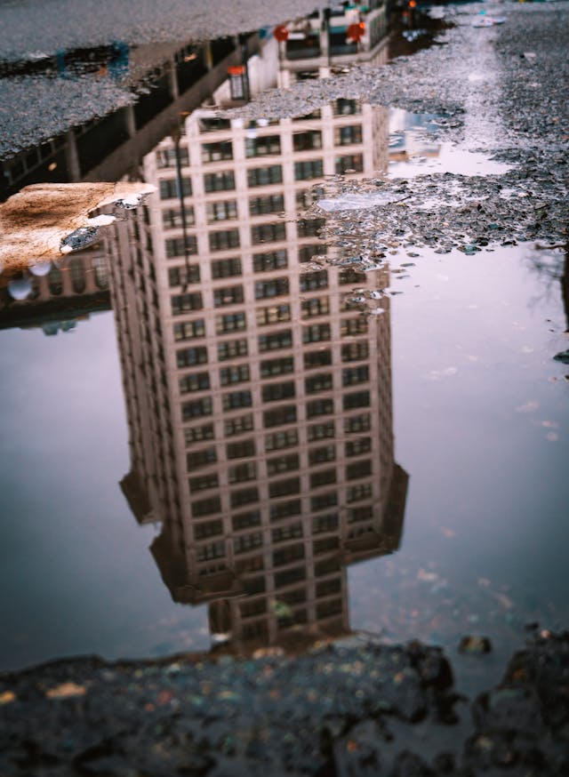 seattle building reflection puddle