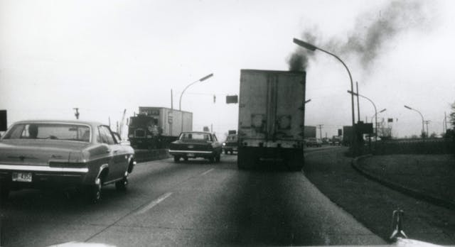 semi truck releasing emissions into air