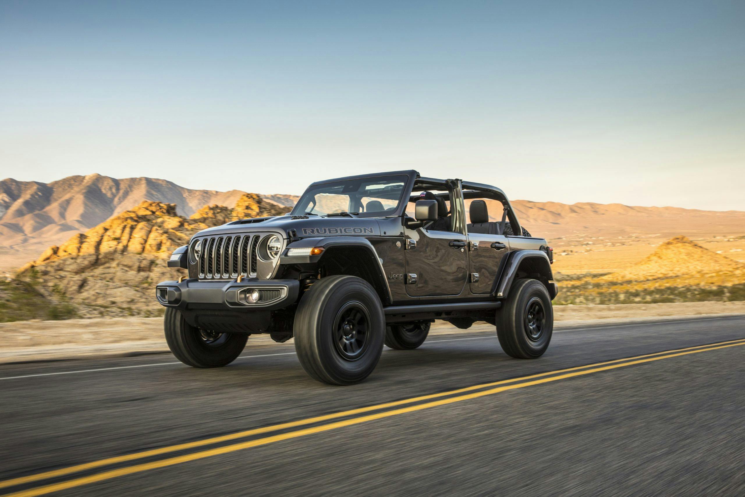 2021 Jeep Wrangler Rubicon 392 gray on road front three quarter moving