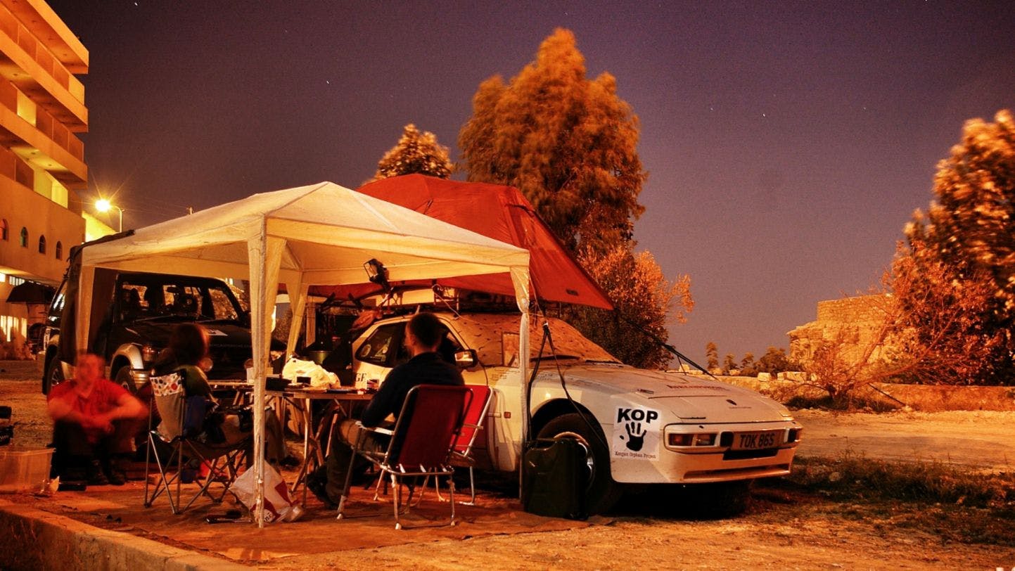 Africa Porsche 944 tent popped resting at night