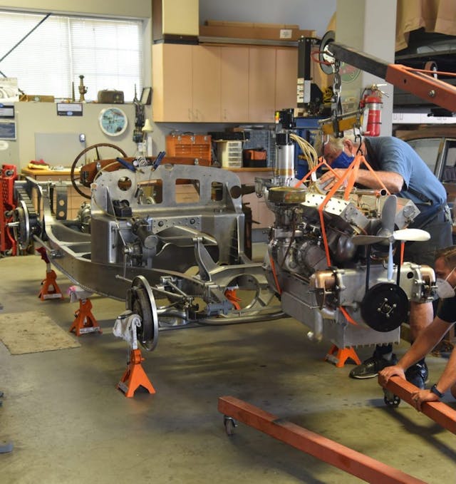 3.3-liter Bugatti straight-eight moving into place