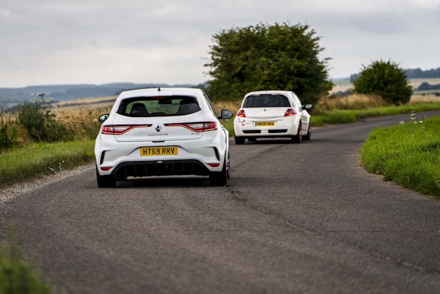 Renault Megane R26R and Trophy R together country road action rear