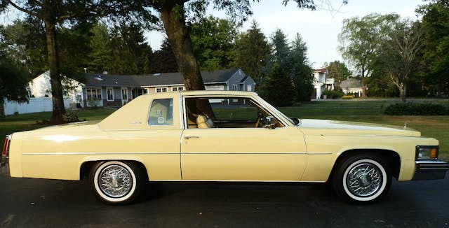 1977 Cadillac Coupe de Ville Naples Yellow side profile