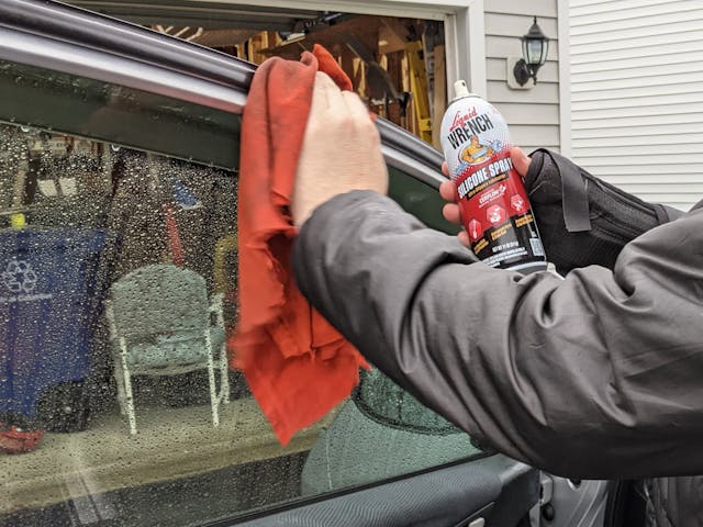 Cleaning door jambs with liquid wrench